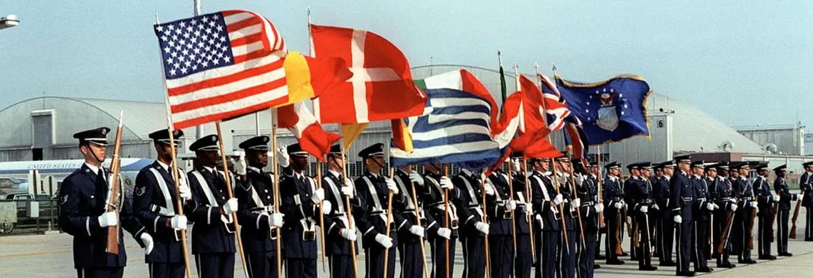 The US Air Force holds an honour guard for visiting NATO commanders at Andrews Air Force Base, 1981. US National Archives.