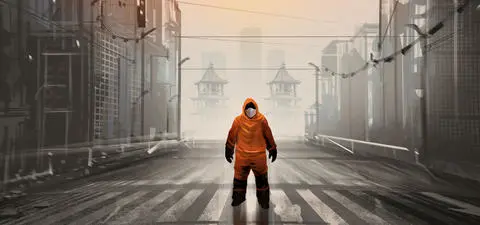 A lone figure in an orange suit stands on a deserted urban street, shrouded in fog, with futuristic buildings and distant structures suggesting a post-apocalyptic setting.