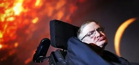 Stephen Hawking, renowned theoretical physicist, sits in his wheelchair against a backdrop depicting a cosmic scene with a bright sun and celestial visuals.