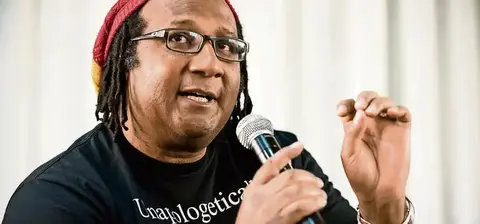 A speaker wearing a black 