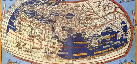 A medieval world map depicting the Mediterranean region, with labeled cities and geographical features, surrounded by illustrations of heads representing the winds.