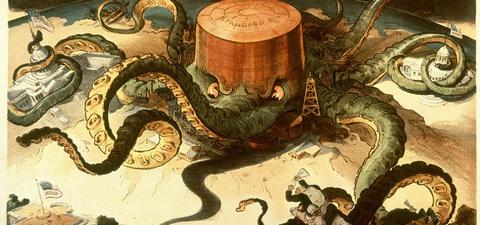 A giant octopus wraps around an oil platform labeled 