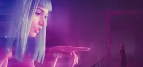 A futuristic scene featuring a woman with blue hair gesturing thoughtfully while a distant figure stands in a dark, colorful environment.