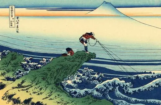 A traditional Japanese woodblock print depicting fishermen casting nets from a rocky shore with Mount Fuji in the background and stylized waves.