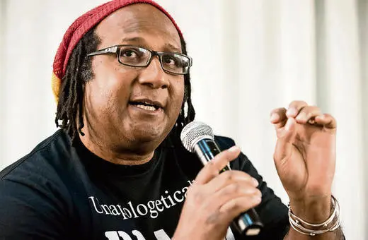 A speaker wearing a black 